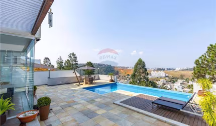 Casa Alto Padrão 3 quartos, 3 suítes, área gourmet com piscina borda infinita, 4 vagas, Condomínio SpinaVille, Juiz de Fora/MG