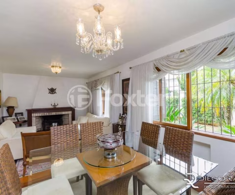 Casa com 3 quartos à venda na Rua Luiz Voelcker, 740, Três Figueiras, Porto Alegre