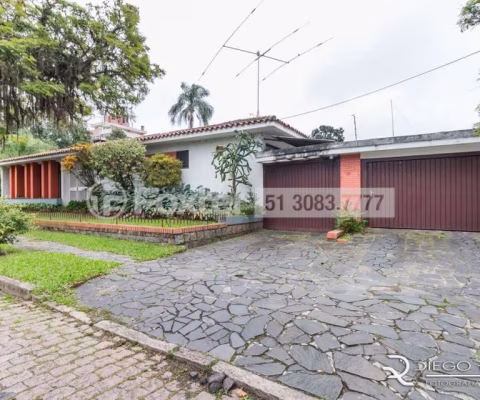 Casa comercial com 2 salas à venda na Travessa Trindade, Jardim Lindóia, Porto Alegre