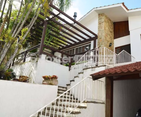 Casa com 4 quartos à venda na Rua Doutor Jorge Fayet, Chácara das Pedras, Porto Alegre