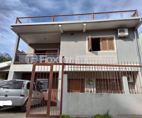 Casa com 5 quartos à venda na Estrada Aracaju, Vila Nova, Porto Alegre