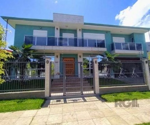 Casa em Porto Alegre, no bairro Hípica, com 3 dormitório(s), e 3 banheiros, à venda.