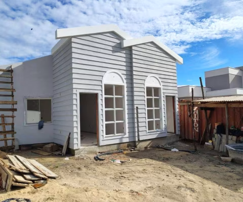 Casa geminada com três dormitórios sendo uma suíte no bairro Fundos em Biguaçu