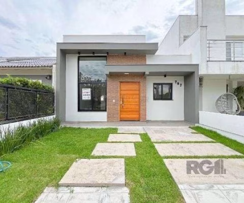 Casa em Porto Alegre, no bairro Hípica, com 3 dormitório(s), e 3 banheiros, à venda.