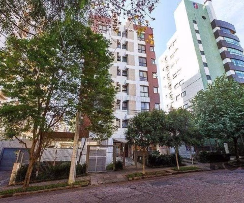 Apartamento de dois quartos, suíte e duas vagas de garagem no bairro Petrópolis em Porto Alegre.