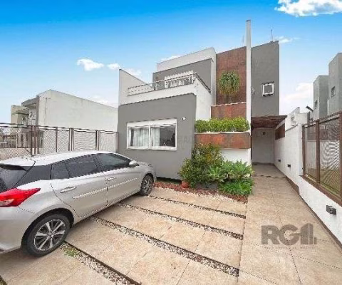 Casa em Porto Alegre, no bairro Hípica, com 3 dormitório(s), e 3 banheiros, à venda.