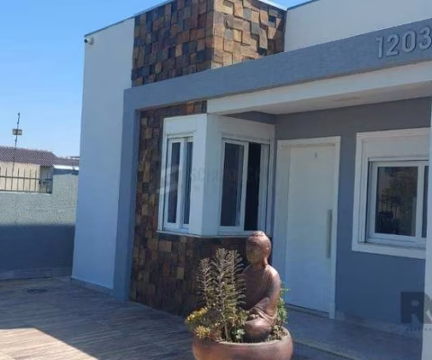 Casa com 2 dormitórios, sendo 1 suíte no bairro Florida em Guaíba