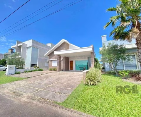 Casa a venda em Condomínio fechado na Beira mar de Atlântida Sul com 3 quartos e 164m²