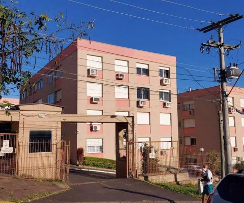 Apartamento de dois dormitórios com uma vaga de garagem no bairro Cristal em Por