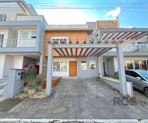 Casa em Porto Alegre, no bairro Hípica, com 3 dormitório(s), e 3 banheiros, à venda.