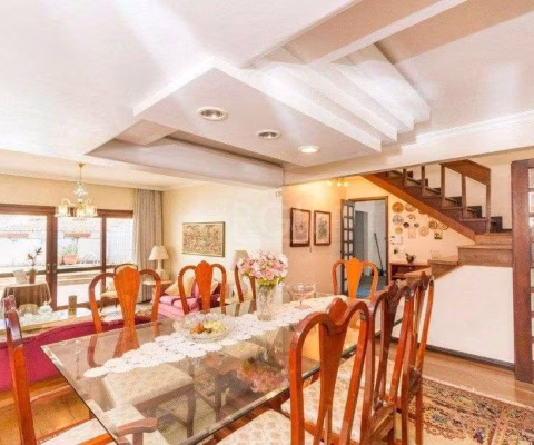 Casa de  333m² com 4 dormitórios, pátio com piscina, espaço gourmet com churrasqueira e 4 vaga de garagem no bairro Passo da Areia