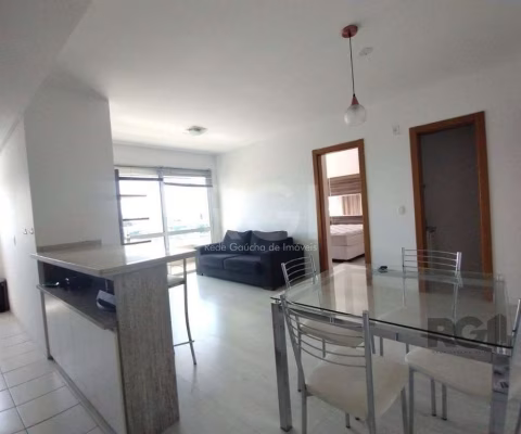 Apartamento mobiliado, 57m2, 1 suite, 1 vaga, lareira e churrasqueira, localizado no bairro Três Figueiras, Porto Alegre/RS.