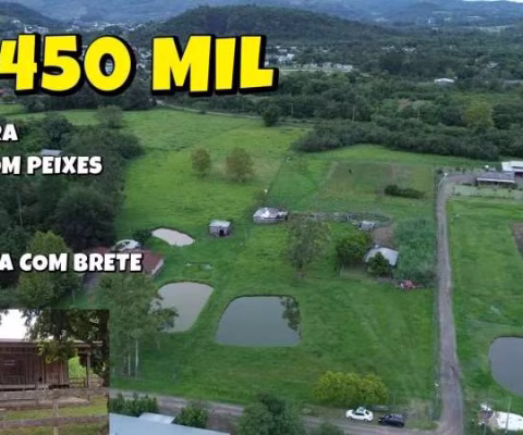 [764] CHÁCARA EM NOVA HARTZ, COM 10000 M², ESCRITURADA, COM CASA, GALPÃO, MANGUEIRA, PEQUENO POMAR