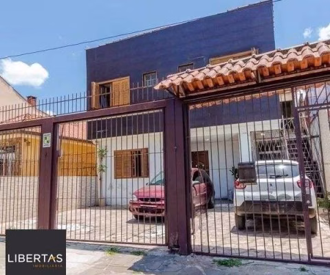 Casa sobrado no Partenon de 4 dormitórios e 2 vagas