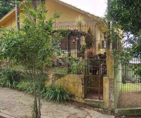 Casa 4 dormitórios à venda Parque Santa Fé Porto Alegre/RS