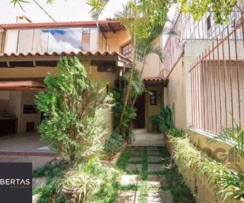 Casa 4 dormitórios à venda Rio Branco Porto Alegre/RS