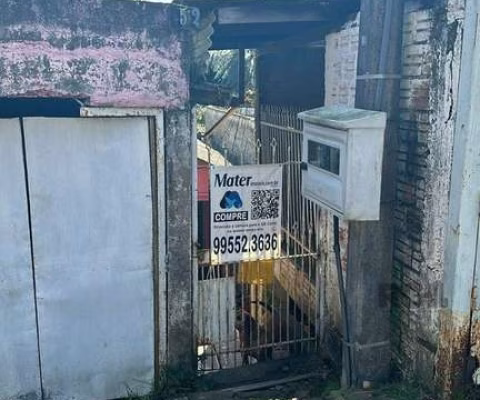 Terreno com 66m² e casa mista, no bairro Vila Nova