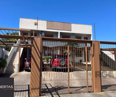 Apartamento térreo, 2 dormitórios, 1 suíte, 2 vagas, Bairro Vista Alegre