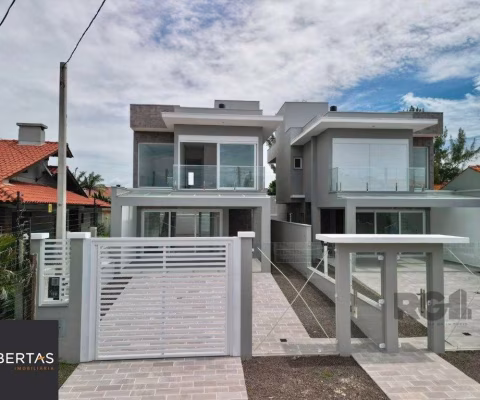 Casa 3 dormitórios à venda Zona Nova Capão da Canoa/RS