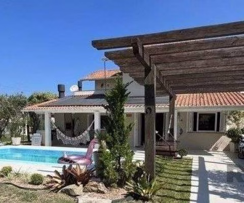 Casa 4 dormitórios à venda Centro Imbé/RS