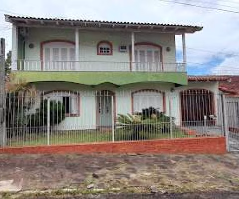 Casa com 4 dormitórios à venda, 226 m² por R$ 640.000,00 - Jansen - Gravataí/RS