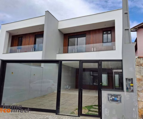 Sobrado Geminado Alto Padrão Novo com 3 Suítes e Escritório à Venda no Saguaçú – R$ 1.380.000,00