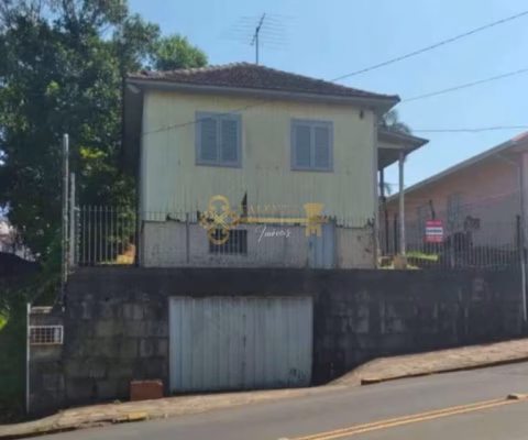 Terreno com casa