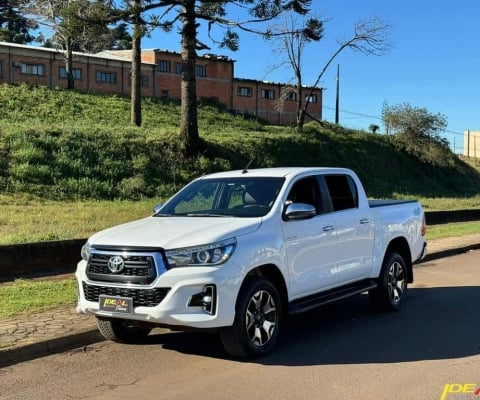 Toyota Hilux SRX - Branca - 2019/2019