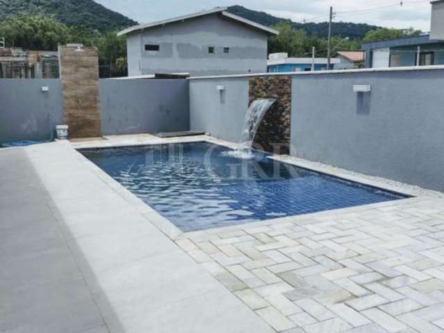 Casa 4 suítes- com piscina no Condomínio Capitanias- Ubatuba- SP