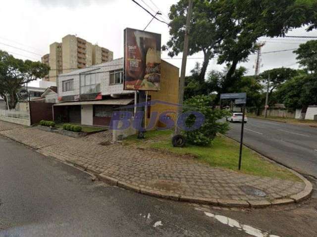 Prédio de esquina à venda no Novo Mundo