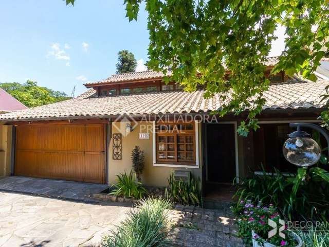 Casa em condomínio fechado com 3 quartos à venda na Avenida Engenheiro Ludolfo Boehl, 1146, Teresópolis, Porto Alegre, 340 m2 por R$ 950.000