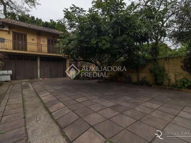 Casa com 3 quartos à venda na Rua General Pedro Bittencourt, 94, Passo da Areia, Porto Alegre, 173 m2 por R$ 980.000