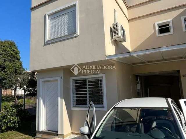 Casa em condomínio fechado com 2 quartos à venda na Rua Cangussu, 329, Nonoai, Porto Alegre, 74 m2 por R$ 372.000