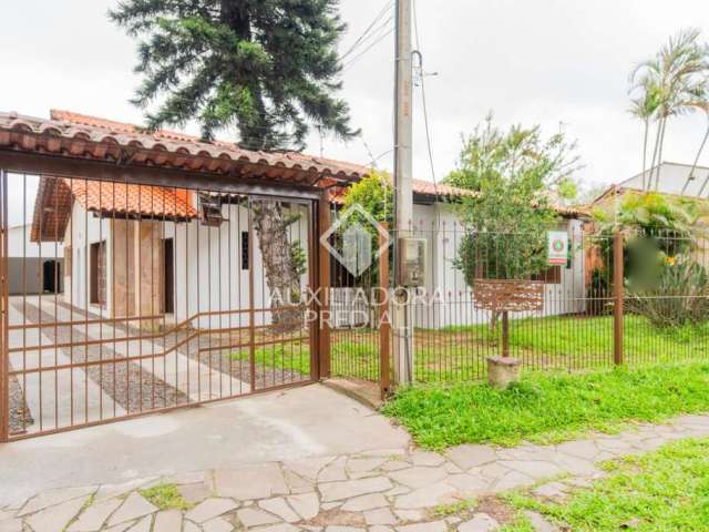 Casa em condomínio fechado com 4 quartos à venda na Avenida Guarujá, 199, Guarujá, Porto Alegre, 226 m2 por R$ 580.000