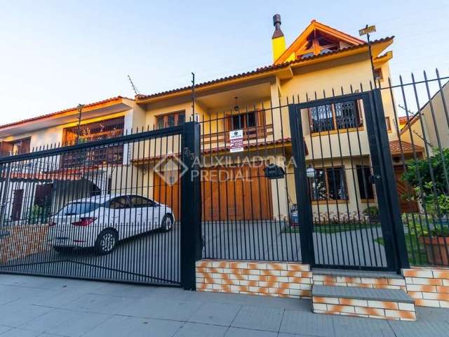 Casa com 3 quartos à venda na Rua Padre Todesco, 783, Partenon, Porto Alegre, 287 m2 por R$ 1.166.600