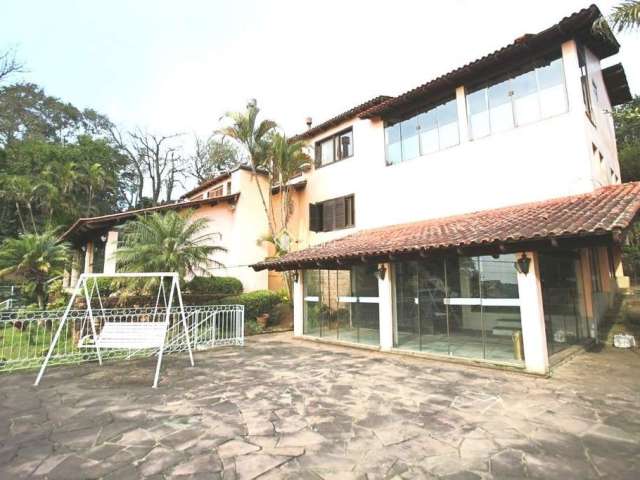 Casa com 3 quartos à venda na Rua Simão Bolívar, 372, Vila Conceição, Porto Alegre, 500 m2 por R$ 2.700.000