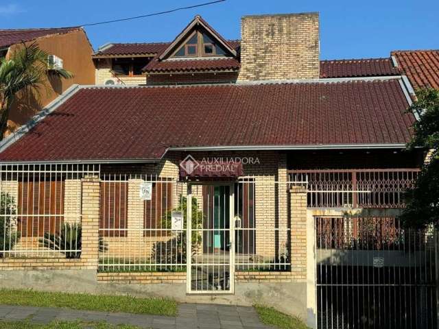 Casa com 3 quartos à venda na Rua Alcebíades Antônio dos Santos, 107, Nonoai, Porto Alegre, 423 m2 por R$ 1.350.000