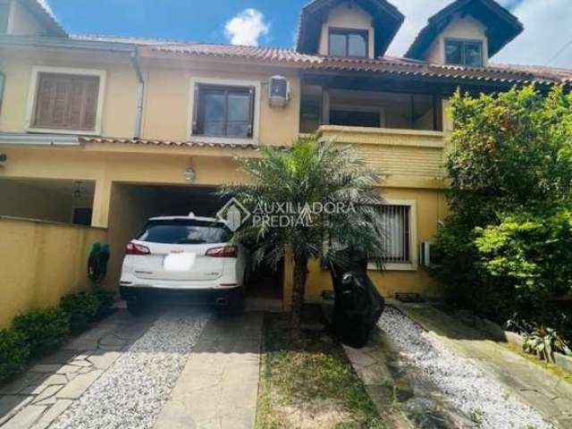 Casa em condomínio fechado com 3 quartos à venda na Avenida da Serraria, 2222, Espírito Santo, Porto Alegre, 121 m2 por R$ 409.000