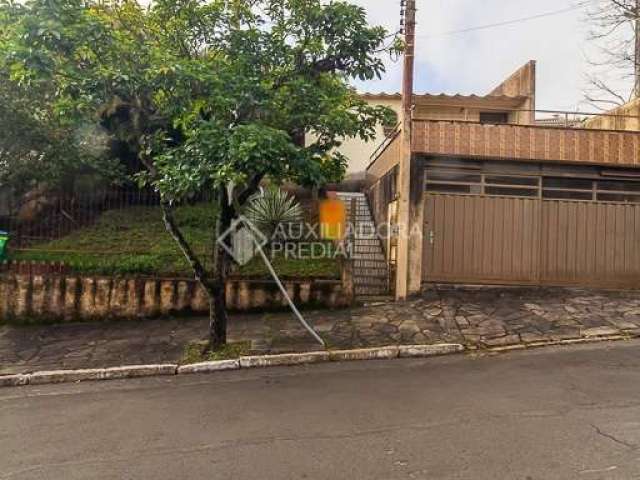 Casa em condomínio fechado com 4 quartos à venda na Rua Fernando Osório, 230, Teresópolis, Porto Alegre, 159 m2 por R$ 655.000