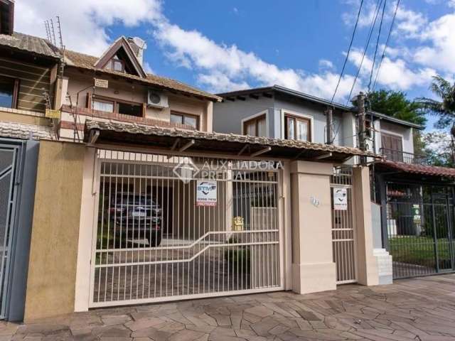 Casa em condomínio fechado com 3 quartos à venda na Avenida Copacabana, 133, Tristeza, Porto Alegre, 197 m2 por R$ 1.330.000