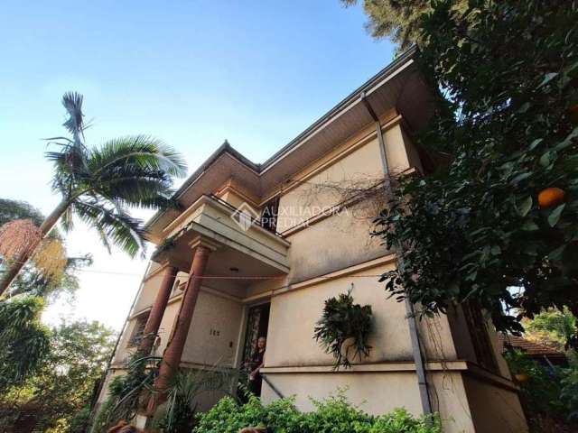 Casa com 4 quartos à venda na Rua Dário Pederneiras, 155, Petrópolis, Porto Alegre, 350 m2 por R$ 2.999.000