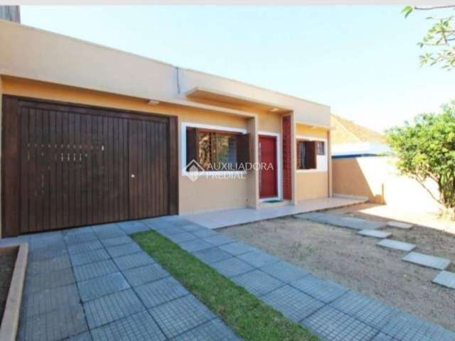 Casa com 3 quartos à venda na Rua Padre João Batista Reus, 1067, Vila Conceição, Porto Alegre, 353 m2 por R$ 990.000