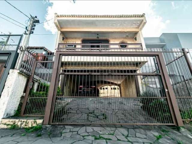 Casa com 3 quartos à venda na Rua Doutor Eduardo Chartier, 275, Passo da Areia, Porto Alegre, 197 m2 por R$ 889.000