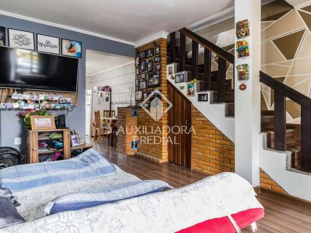 Casa com 2 quartos à venda na Rua Amaury Silveira, 368, Mário Quintana, Porto Alegre, 110 m2 por R$ 450.000