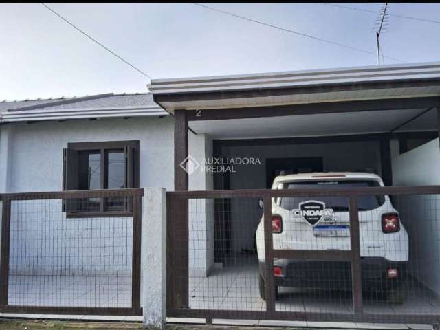 Casa com 2 quartos à venda na Cinamomos, 638, Quatro Lagos, Arroio do Sal, 52 m2 por R$ 245.000