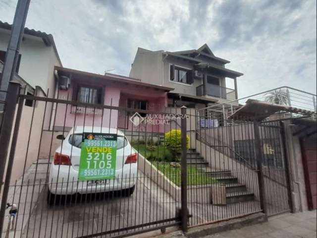 Casa com 2 quartos à venda na Rua Tenente Isolino Segobia, 58, Vila Nova, Porto Alegre, 81 m2 por R$ 350.000