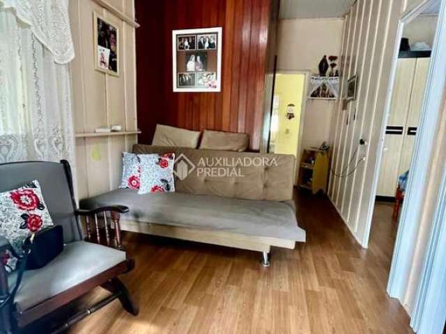 Casa com 4 quartos à venda na Rua Octávio de Souza, 722, Teresópolis, Porto Alegre, 150 m2 por R$ 235.000