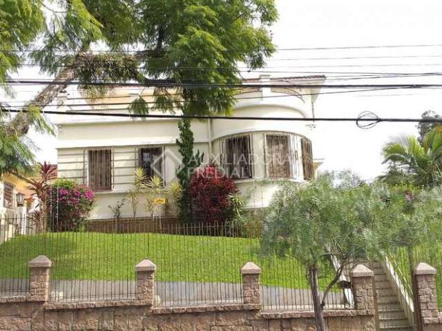 Casa em condomínio fechado com 3 quartos à venda na Rua Guilherme Schell, 209, Santo Antônio, Porto Alegre, 377 m2 por R$ 1.720.000