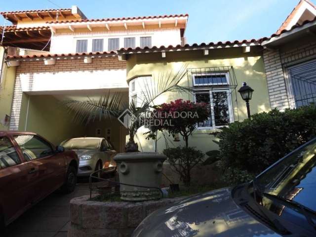 Casa com 3 quartos à venda na Rua Canto e Melo, 232, Nonoai, Porto Alegre, 200 m2 por R$ 599.000