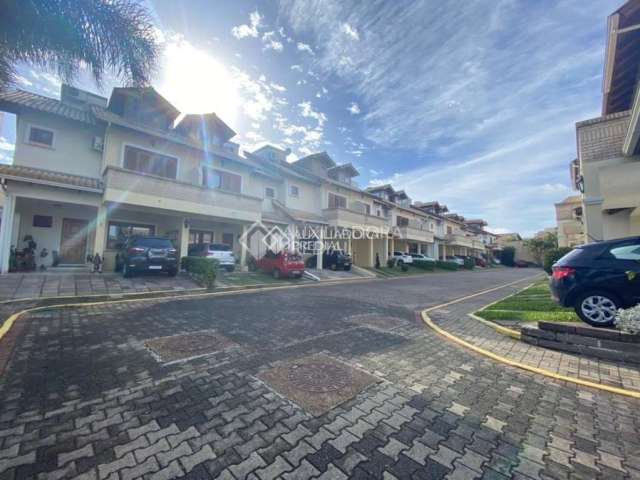 Casa em condomínio fechado com 3 quartos à venda na Avenida Eduardo Prado, 1954, Cavalhada, Porto Alegre, 192 m2 por R$ 948.860